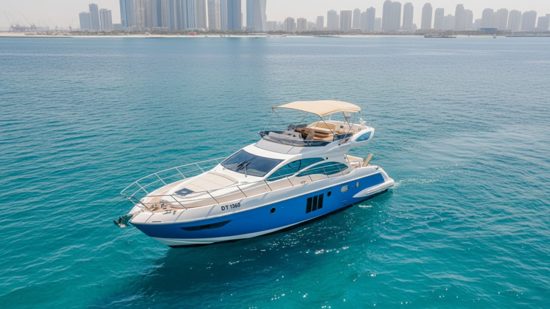 Aerial view of Royal Voyager 48 ft cruising Dubai Marina